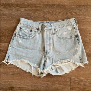 Light blue distressed Levi’s 501 shorts
